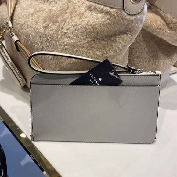 Kate Spade Lucy Medium L-Zip Wristlet 
COLOR: Platinum Grey Multi 
NWT - Picture 15 of 16